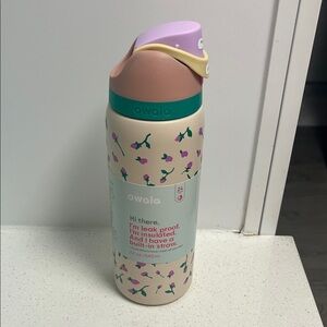 Owala Pink and Cream Insulated Water Bottle with Straw